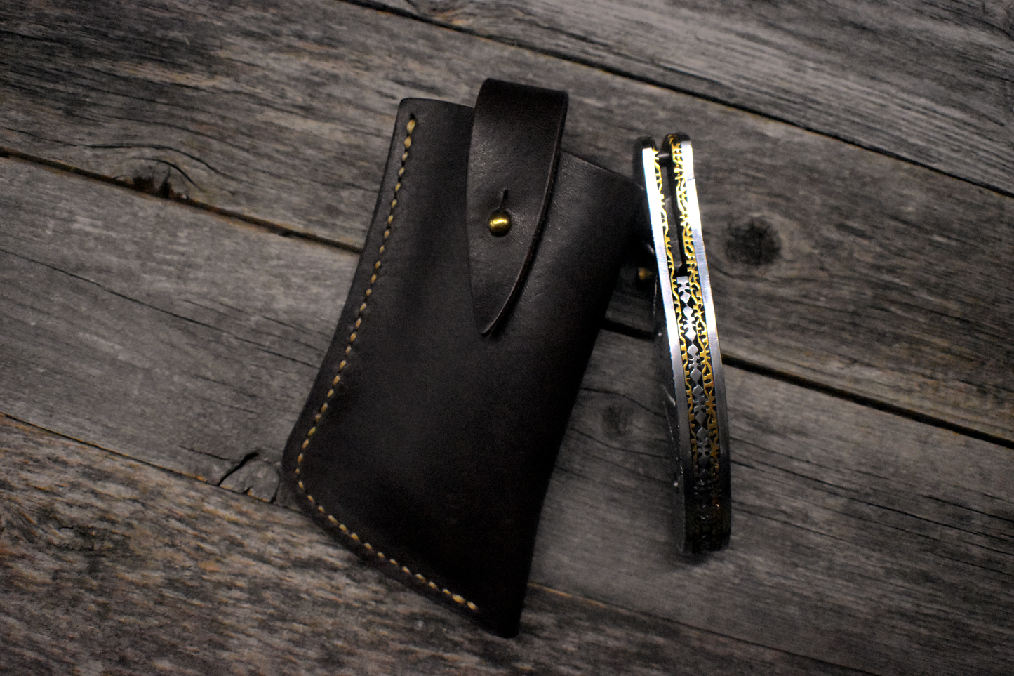 Damascus Pocket Knife – Carved Steel Handle
