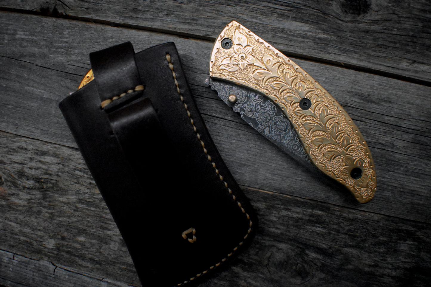 Damascus Pocket Knife – Carved Brass Handle