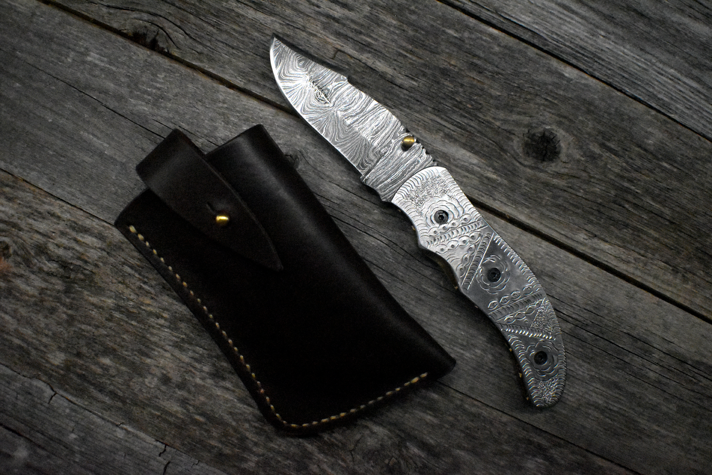 Damascus Pocket Knife – Carved Steel Handle