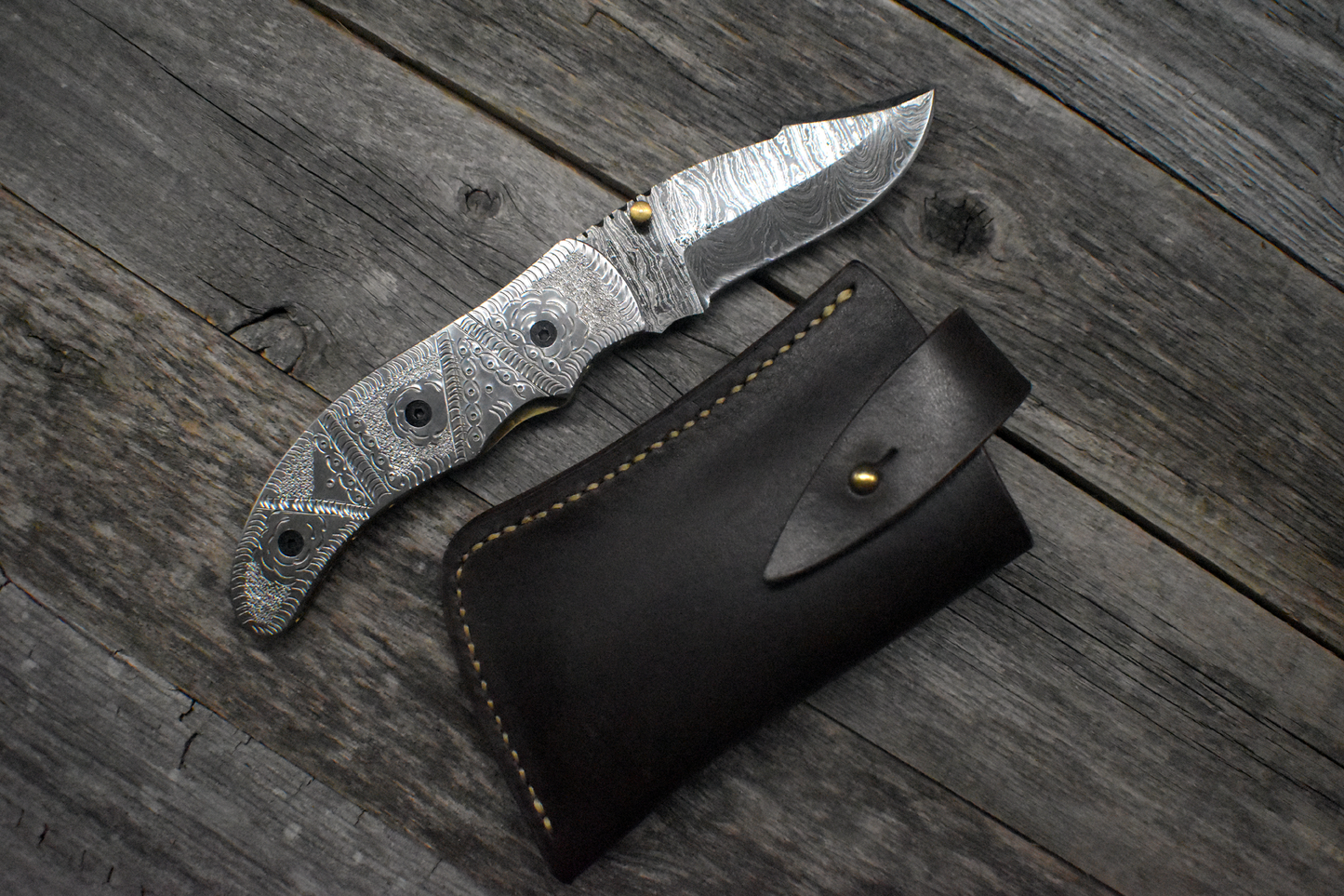 Damascus Pocket Knife – Carved Steel Handle