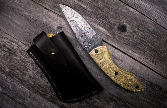 Damascus Pocket Knife – Carved Brass Handle
