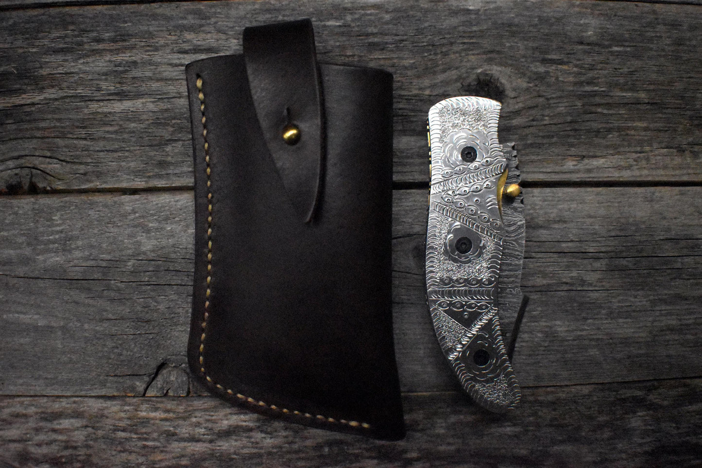 Damascus Pocket Knife – Carved Steel Handle
